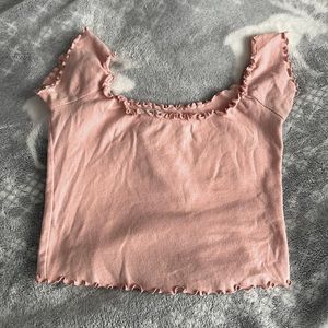 Stretchy pink scoop neck crop top